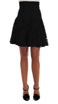 Black floral lace A-line skirt with cutout details from Dolce & Gabbana, featuring an elegant and feminine design.