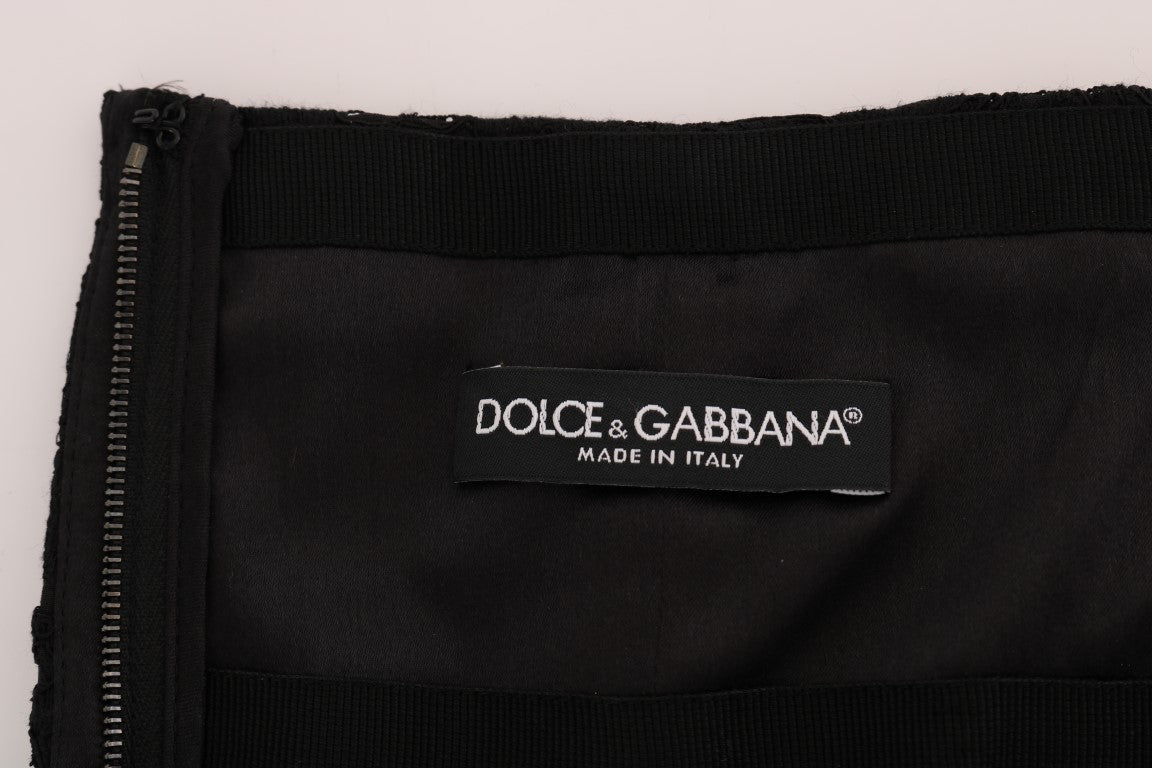 Black floral lace Dolce & Gabbana A-line skirt with cutout details and a flattering silhouette.