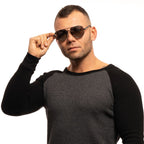 Guess gray metal sunglasses with sleek frame and polarized lenses, stylish accessory for sun protection and fashion.