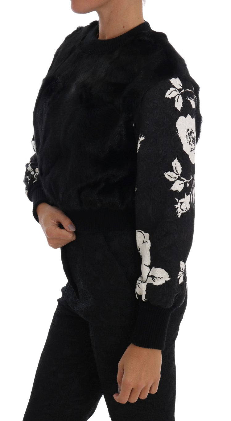 Dolce & Gabbana black fur floral brocade zipper sweater displayed on a hanger showing detailed floral embroidery and fur accents.
