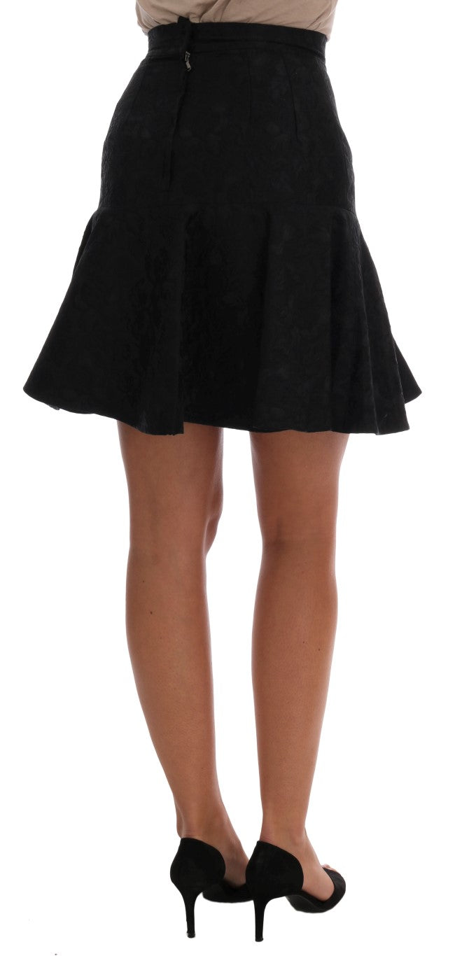 Dolce & Gabbana black floral jacquard silk A-line skirt with elegant floral pattern and smooth fabric.