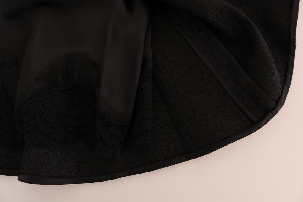 Dolce & Gabbana black floral jacquard silk A-line skirt with intricate floral pattern and elegant design.