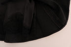 Dolce & Gabbana black floral jacquard silk A-line skirt with intricate floral pattern and elegant design.