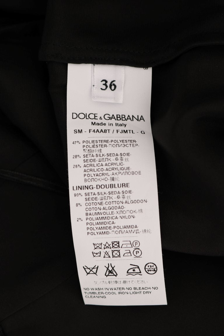 Dolce & Gabbana black floral jacquard silk A-line skirt with a fitted waist and intricate floral pattern.