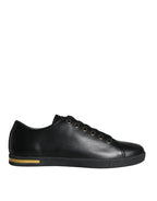 Dolce & Gabbana black and gold leather classic sneakers with stylish design and comfortable fit.