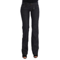 Dark blue cotton jeans by Costume National featuring a classic fit and minimalist design, shown on a model.