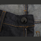 Dark blue cotton classic fit jeans by Costume National, showing a close-up of the denim fabric and stitching details.