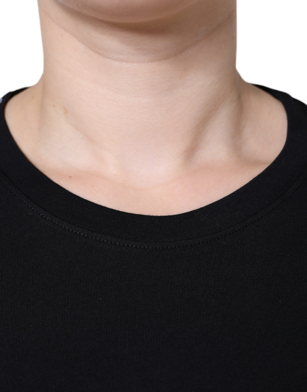 Black cotton crew neck short sleeve T-shirt by Dolce & Gabbana, featuring a simple, classic design and smooth fabric.