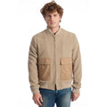 Roberto Pepe Luxury beige wool men's jacket displayed on a hanger, showcasing its tailored design and smooth fabric.