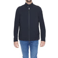 Suns Black Nylon Shell Jacket hanging on a hanger, showcasing its sleek design and smooth fabric for outdoor wear.