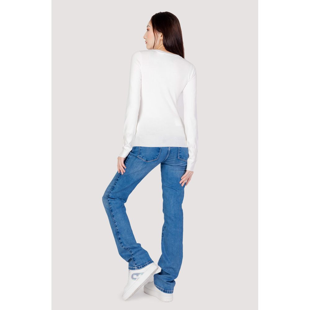White cotton sweatshirt by Guess with a relaxed fit, crew neckline, and subtle brand logo detail on the chest.