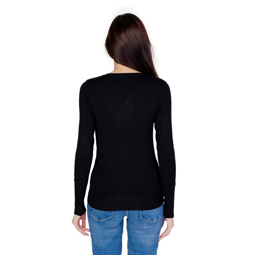 Black cotton sweatshirt by Guess featuring a relaxed fit and classic crew neckline, soft fabric with subtle brand logo detail.