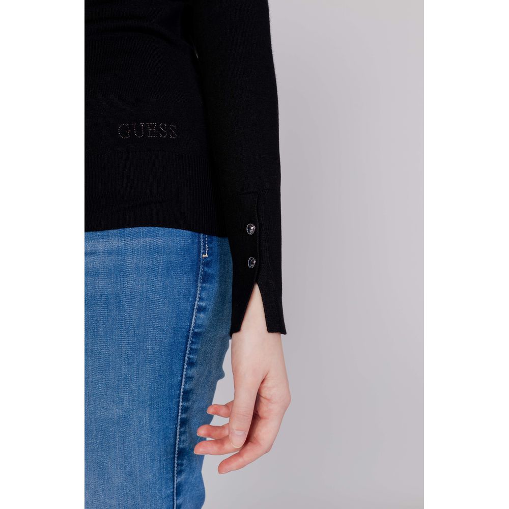 Black cotton sweatshirt by Guess with a classic crewneck design and subtle branding detail on the front.