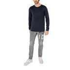 Blue cotton sweatshirt by Jack Jones with a crew neck and relaxed fit, displayed on a hanger.