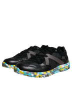 Dolce & Gabbana black polyester low-top men's sneakers with sleek design and white sole, stylish and comfortable footwear.