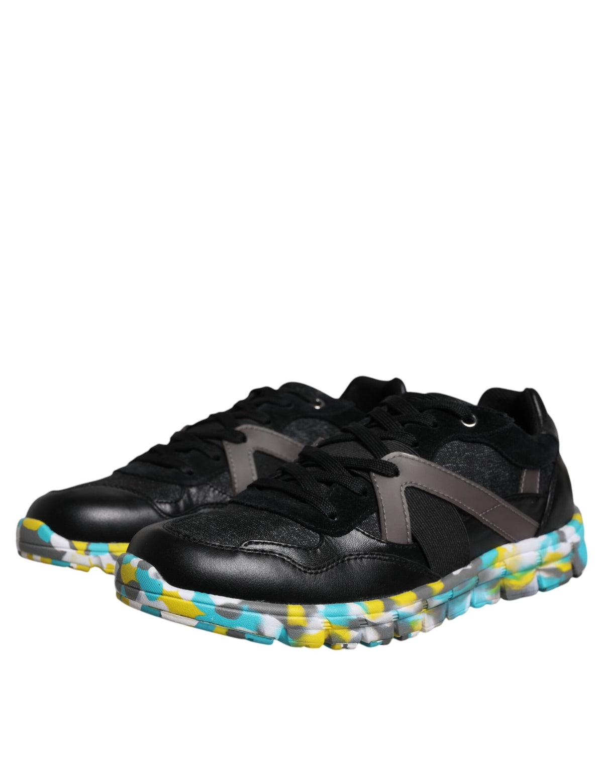 Dolce & Gabbana black polyester low-top men's sneakers with sleek design and white sole, stylish and comfortable footwear.