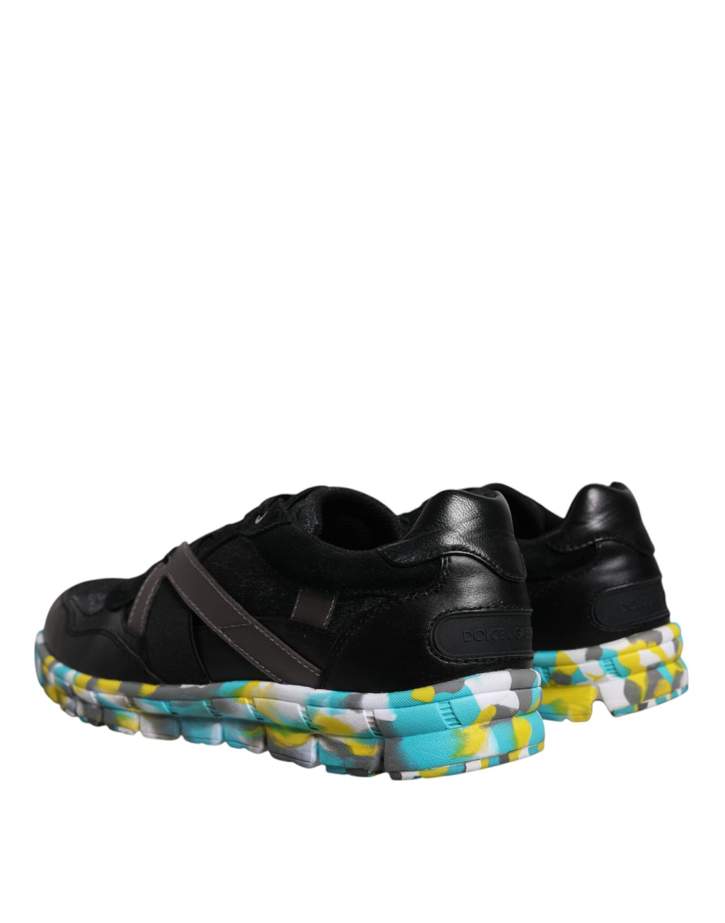 Dolce & Gabbana black polyester low-top men's sneakers with sleek design and lace-up closure.