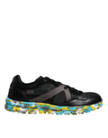 Black polyester low top men's sneakers by Dolce & Gabbana featuring sleek design and modern style.