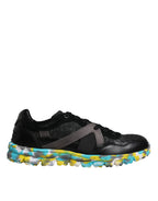 Black polyester low top men's sneakers by Dolce & Gabbana featuring sleek design and modern style.