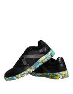 Dolce & Gabbana black polyester low-top men's sneakers with sleek design and lace-up closure.