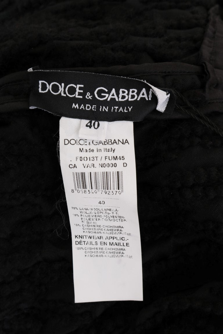 Dolce & Gabbana black wool pullover sweater with fringes, featuring a cozy knit design and stylish detailing.