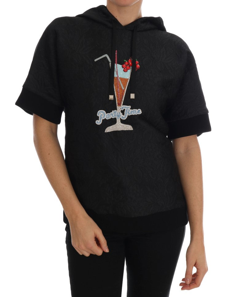 Black fairy tale crystal hooded sweater by Dolce & Gabbana with intricate crystal embellishments and a cozy hood design.