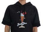 Black fairy tale crystal hooded sweater by Dolce & Gabbana featuring intricate crystal embellishments and a cozy hood.