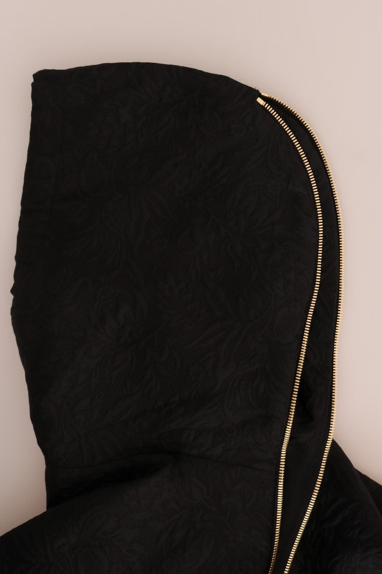 Black hooded sweater by Dolce & Gabbana with crystal embellishments and fairy tale-inspired design.