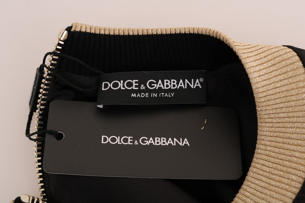 Dolce & Gabbana black fairy tale brocade zipper sweater with intricate floral pattern and front zipper detail.