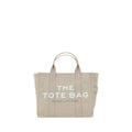 Beige cotton Marc Jacobs handbag with structured design and top handles, showcasing a stylish, casual accessory.
