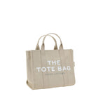 Marc Jacobs beige cotton handbag with structured design and top handles, stylish accessory for casual or elegant outfits.