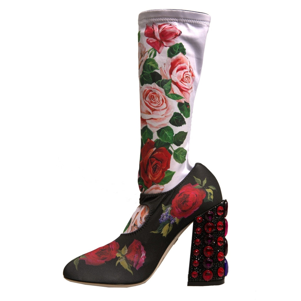 Dolce & Gabbana black floral socks paired with crystal-embellished jersey shoes and boots, stylish and luxurious footwear.