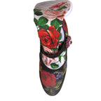 Dolce & Gabbana black floral socks paired with crystal-embellished jersey shoes in this stylish product image.