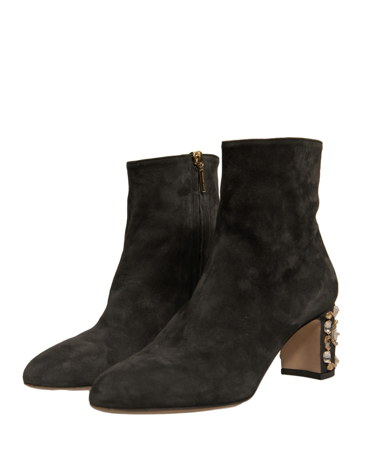 Black embellished heel ankle boots by Dolce & Gabbana with pointed toes and decorative studs, showcasing luxurious designer footwear.