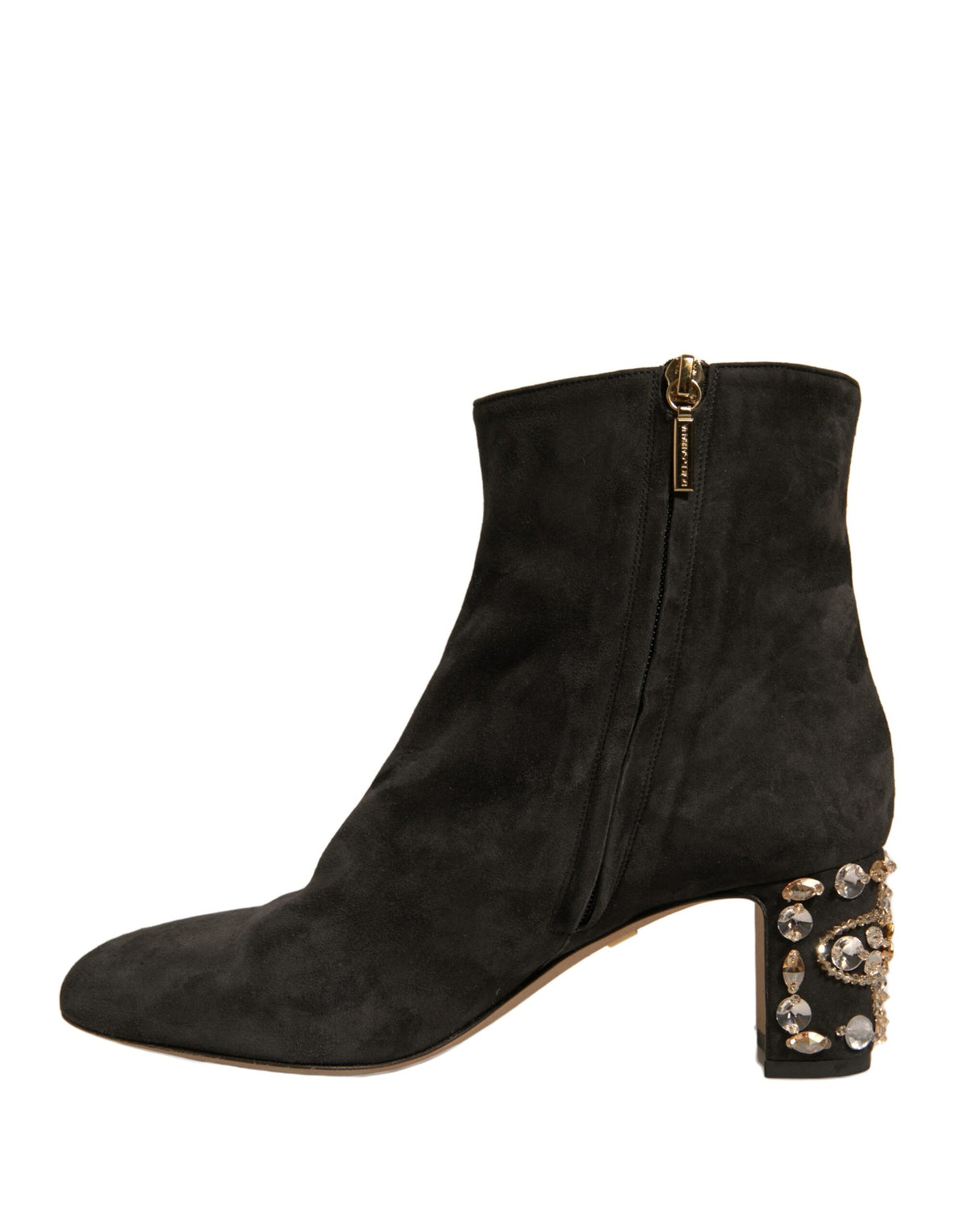 Black embellished heel ankle boots by Dolce & Gabbana with pointed toes and decorative accents, stylish and luxurious footwear.