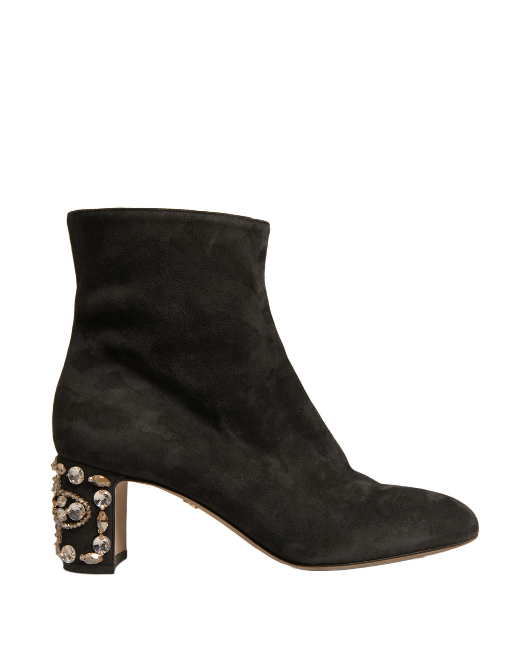 Black embellished heel ankle boots by Dolce & Gabbana with pointed toes and decorative detailing.