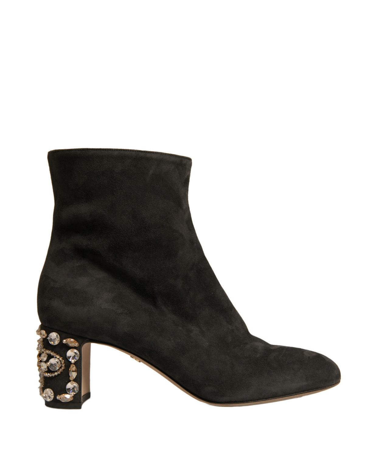 Black embellished heel ankle boots by Dolce & Gabbana with pointed toes and decorative detailing.