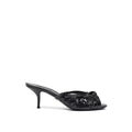 Dolce & Gabbana black snake skin platform sandals with ankle straps and chunky heels, stylish and luxurious footwear.