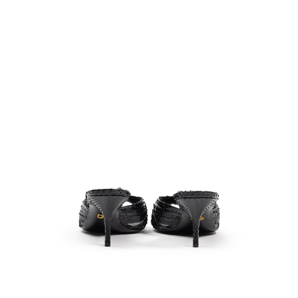 Dolce & Gabbana black snake skin platform sandals with ankle straps and chunky heels.