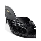 Dolce & Gabbana black snake skin platform sandals with strappy design and chunky heels.