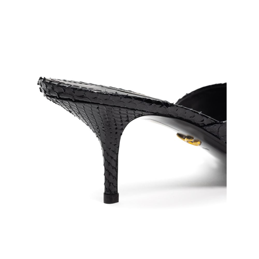 Dolce & Gabbana black snake skin platform sandals with open toes and ankle straps, stylish and luxurious footwear.