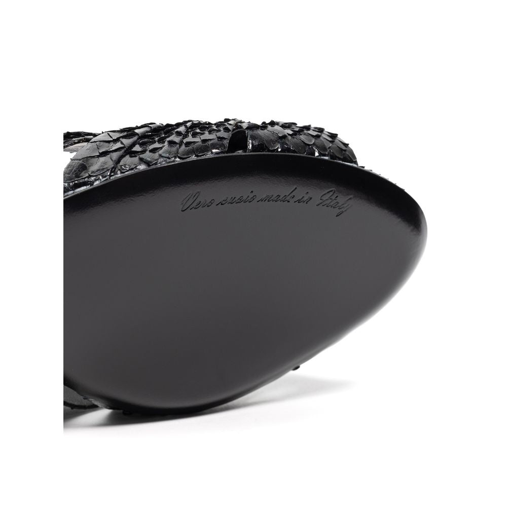 Dolce & Gabbana black snake skin platform sandals with ankle straps and chunky heels.