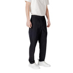 Black Calvin Klein Jeans polyester casual pants with a relaxed fit, featuring a comfortable waistband and classic design.