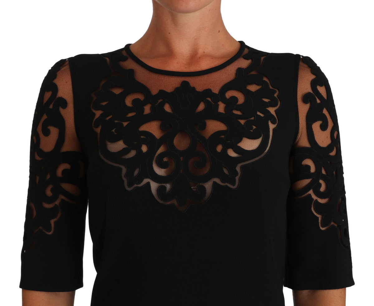 Dolce & Gabbana black floral cut-out pattern cocktail dress with elegant design and intricate floral details.