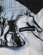 Dolce & Gabbana Blue Statue Print Cotton Mens Shorts - Eljoys Fashion 