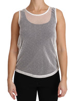 Dolce & Gabbana white net sleeveless tank top, transparent and stylish, shown on a model.