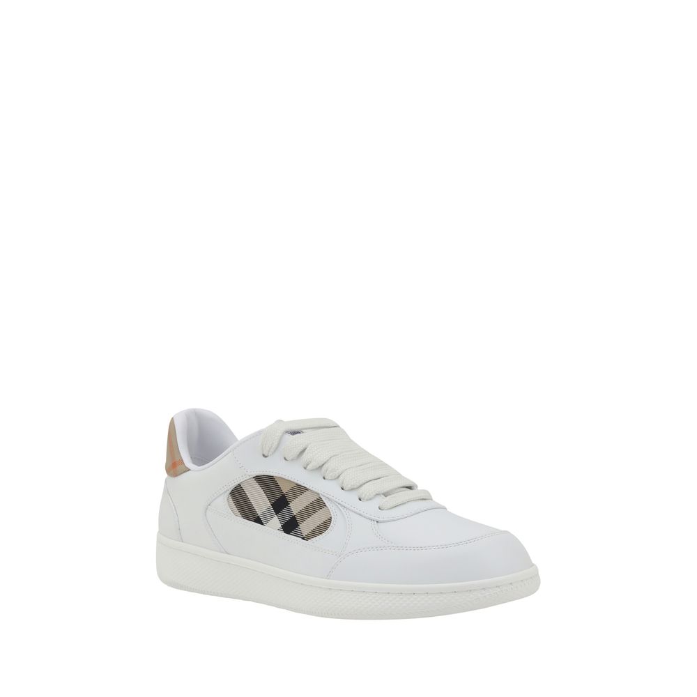 Burberry white calf leather Bos Taurus low top sneakers showing sleek leather design and classic low-profile style.
