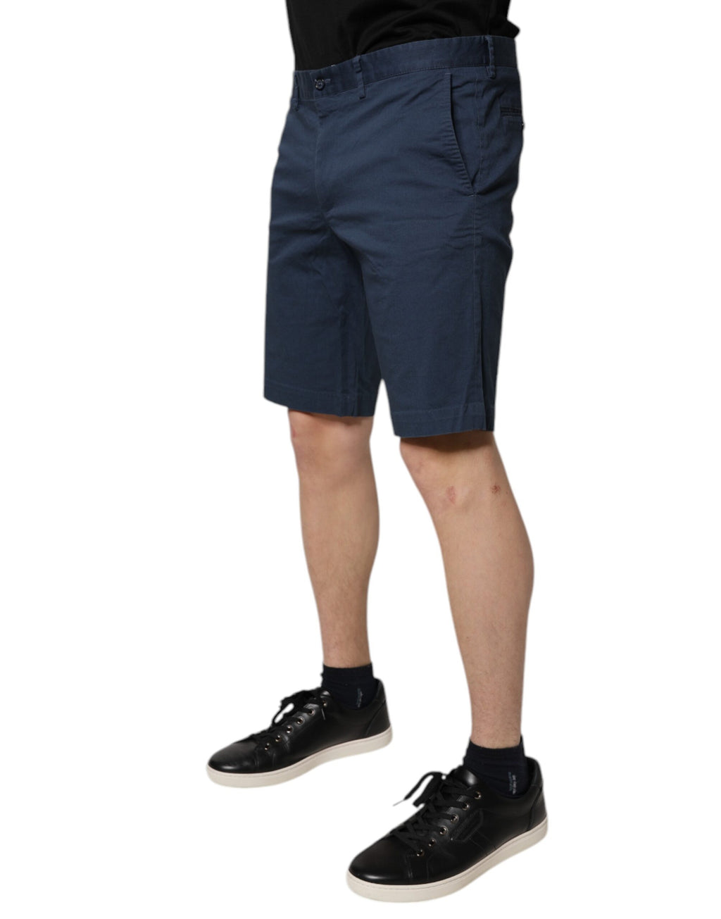 Blue cotton Dolce & Gabbana men's mid-waist Bermuda shorts displayed on a hanger.
