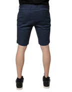 Blue cotton Dolce & Gabbana men's mid-waist Bermuda shorts, shown with a relaxed fit and casual style.