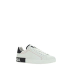 Dolce & Gabbana white calf leather Bos Taurus low top sneakers with sleek design and subtle branding details.
